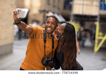 young couple taking a selfie together