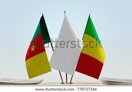 Flags of Cameroon and Mali with a white flag in the middle