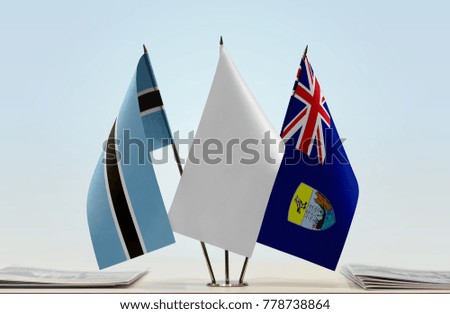 Flags of Botswana and Saint Helena with a white flag in the middle