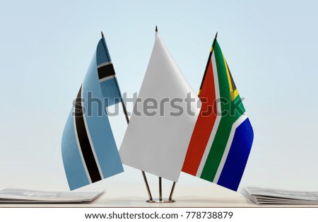 Flags of Botswana and Republic of South Africa with a white flag in the middle