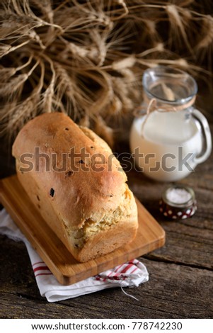 Homemade onion bread on an old wooden background. Rustic style.