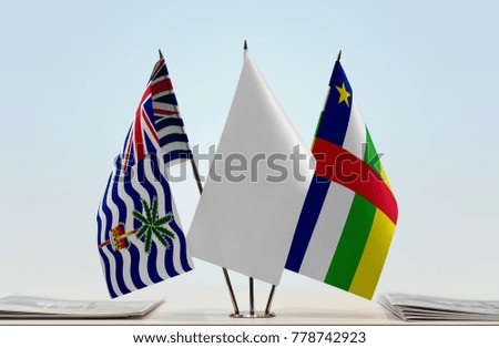 Flags of British Indian Ocean Territory and Central African Republic with a white flag in the middle