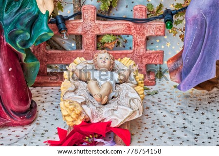 Christmas Nativity scene with The Holy Child, The Blessed Virgin Mary and Saint Joseph