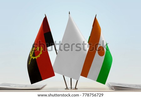 Flags of Angola and Niger with a white flag in the middle