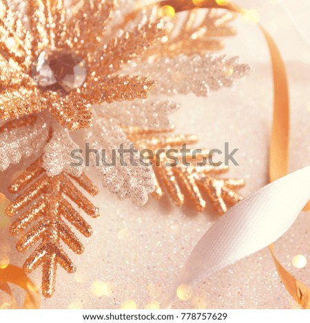 Christmas background with Golden decorative snowflake