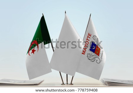 Flags of Algeria and Mayotte with a white flag in the middle