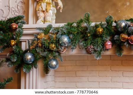 Classic christmas and New Year decorated interior room with presents and New year tree. Christmas tree with gold, blue and silver decorations