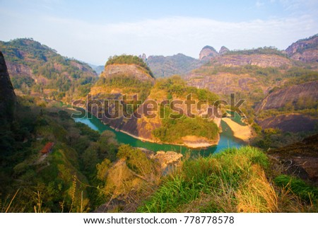 Mount Wuyi scenery. The picture is Tianyou peak scenic spot of Mount Wuyi. The river is Nine-twist Stream. The Mount is located in Nanping, Fujian, China.  