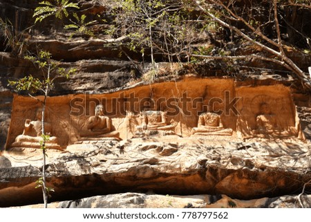 Buddha carved on the mountain is what is found in Thailand. It is very old. Creator profile not found. Discovered in the deep forest on the mountain. It's a great thing. Picture history