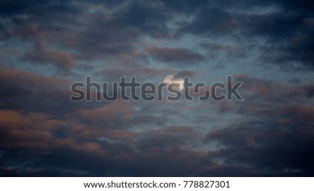 the full moon with blue sky in the night time 