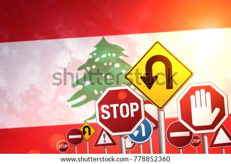 Road stop signs on a background of Lebanon flag
