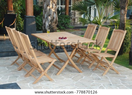 Rectangular folding table with folding chair