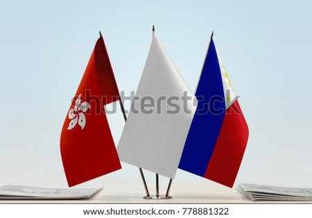 Flags of Hong Kong and Philippines with a white flag in the middle