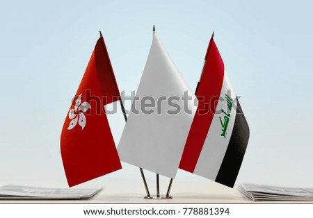Flags of Hong Kong and Iraq with a white flag in the middle