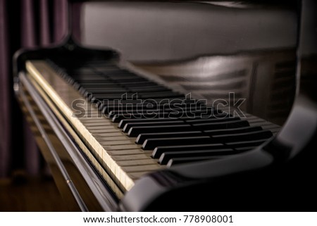 black piano and keyboard