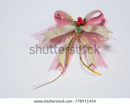 Sweet pink and gold ribbon bow for gifts
