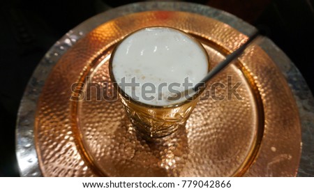 Cold coffee served in bronze tray