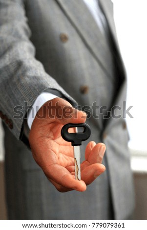 businessman hand with key no people stock photography stock photo