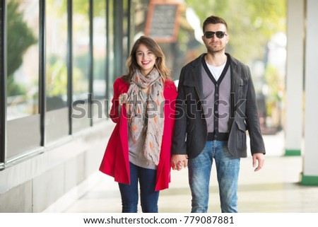 Cheerful young couple in the city