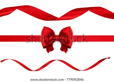Red ribbon bow with ribbons on white background. studio shot