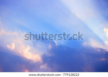 Sunlight Beam Shining Through the Heaven Blue Skies Background.