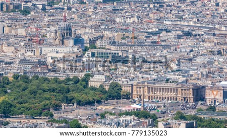 Top view of Paris skyline from above timelapse. Main landmarks of european megapolis with Place de la Concorde. Bird-eye view from observation deck of Montparnasse tower. Paris, France