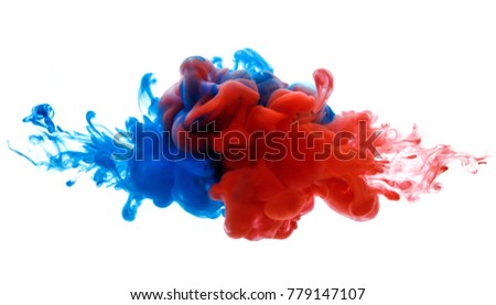 Symbol of rivalry and struggle or merging of a compound. Ink in water red and blue isolated on white Royalty-Free Stock Photo #779147107