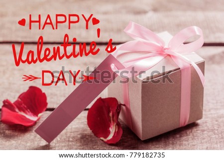 Roses and a hearts on wooden board, Valentines Day background