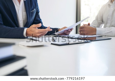 Agent man presentation and consulting car insurance detail to customer and waiting for his reply to finish. Royalty-Free Stock Photo #779216197