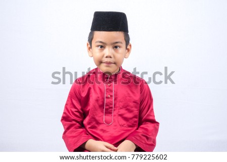 Potrait of young asian muslim boy/girl isolated on white background.