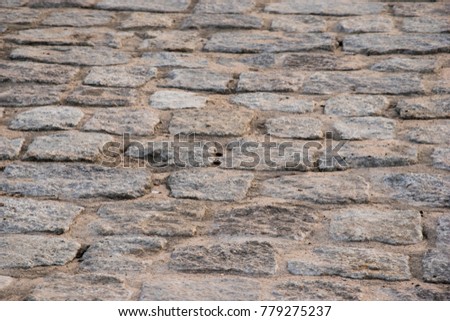 old paving stone, pavement footpath close up photo