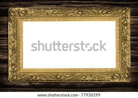 picture gold frame on a wood background
