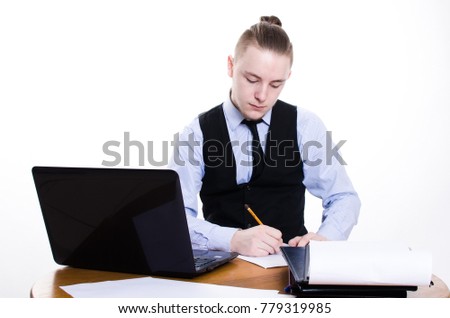 Close-up of a businessman working on a laptop