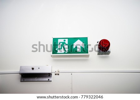emergency escape way from the building,fire alarm system,fire exit sign,door to staircase.Bell alarm.