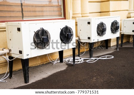 Street Photography Objects - Air Conditioning in close up. perspective background. a lot, many Exhaust fan. facade of office building.