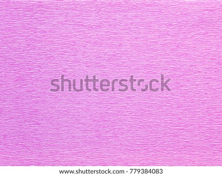 Bright pink craft crepe paper texture closeup. 
