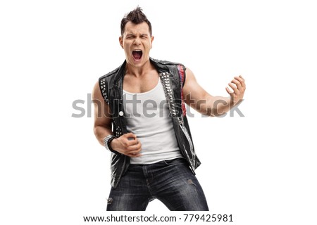 Punk rocker playing air guitar isolated on white background Royalty-Free Stock Photo #779425981
