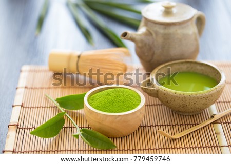 Set of matcha powder bowl wooden spoon and whisk green tea leaf Organic Green Matcha Tea ceremony. Royalty-Free Stock Photo #779459746