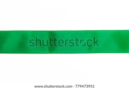 Green satin ribbon isolated on white background