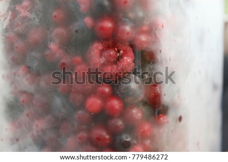 Frozen mix berry in refrigerator.