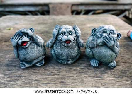 Three monkey,close up of hand small statues with the concept of see no evil, 

hear no evil and speak no evil.