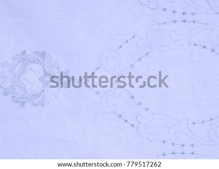 Texture, background, pattern. Tulle of pastel tones. Close the purple folded lace. Pastel purple crumpled tulle as background. Macro view of sewing dresses. Pure wedding textiles.