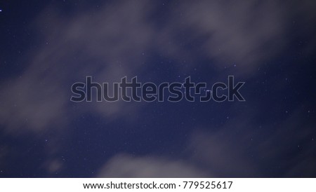 Stars in the blue sky with white clouds 