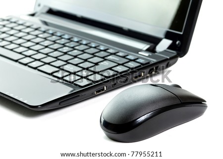 Mouse and netbook isolated on white