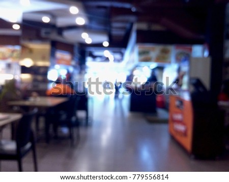blurred background : exclusive interior of cafe restaurant with over exposure at the entrance door