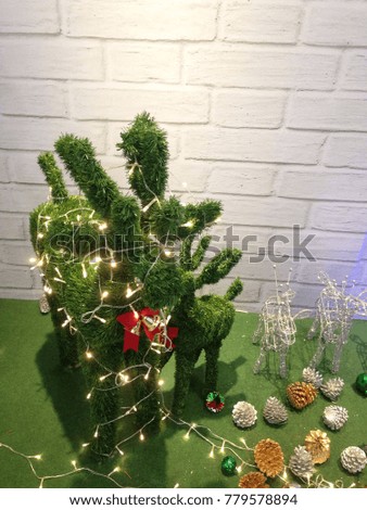 cute reindeer with decorated antlers for Christmas