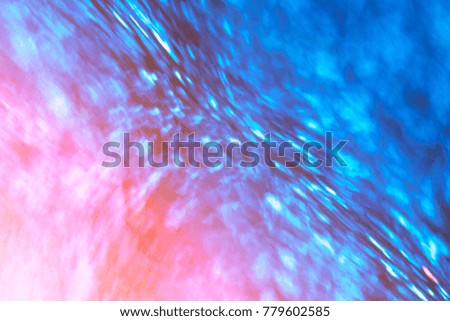 Abstract xmas Blue glitter lights. Christmas festive  background. Defocused bokeh  particles. Template for design