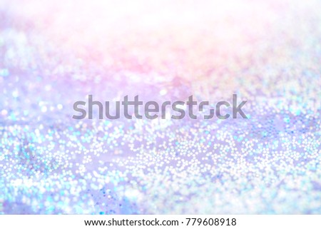 Abstract xmas silver glitter lights. Christmas festive  background. Defocused bokeh  particles. Template for design