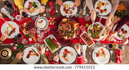 Christmas new year dinner group concept Royalty-Free Stock Photo #779611012
