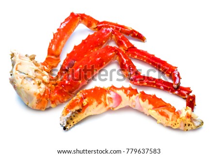 Alaskan King Crab isolated on white background, Cooked Organic Alaskan King Crab Legs on white, Royalty-Free Stock Photo #779637583